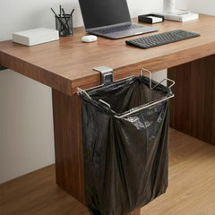 Compact trash bag holder sized 8.3 by 5.5 inches