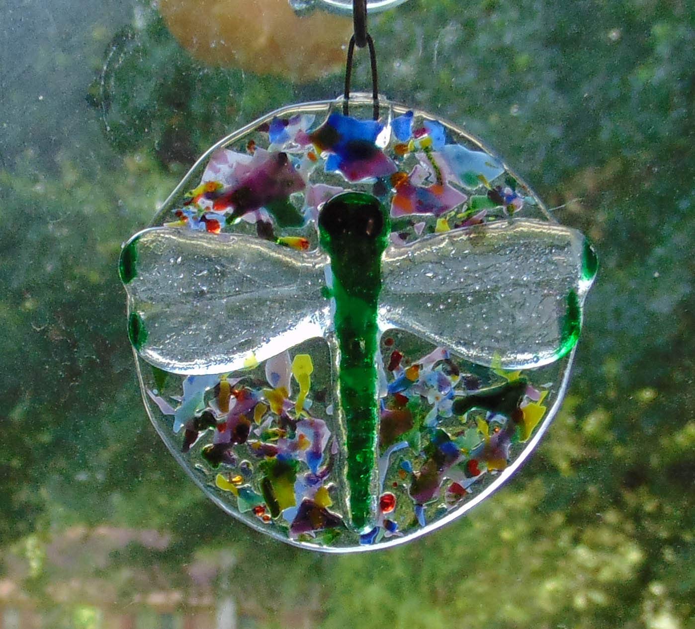 Round garden ornament with fused glass dragonfly image
