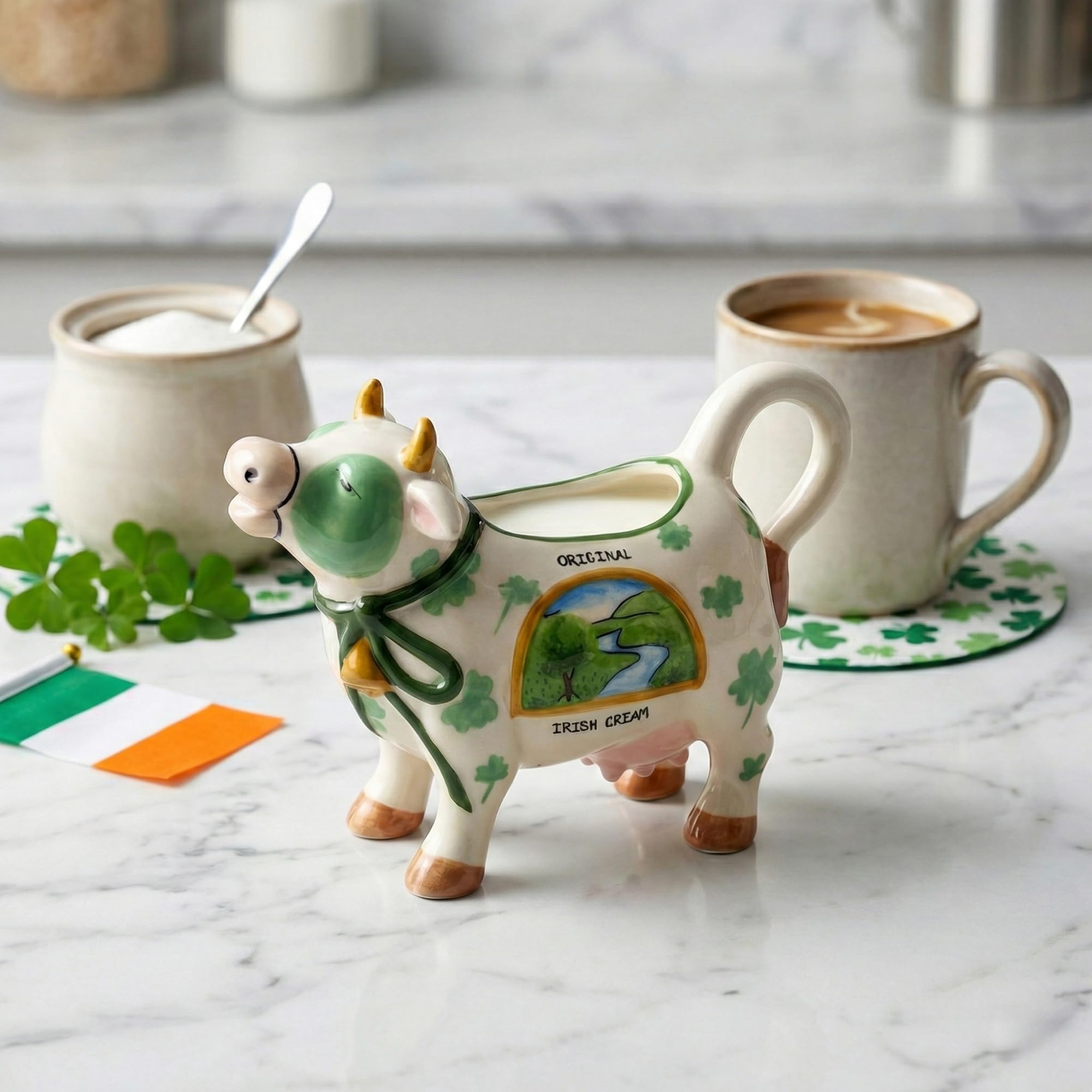 Hand painted ceramic creamer with cow motif by Blue Sky Clayworks