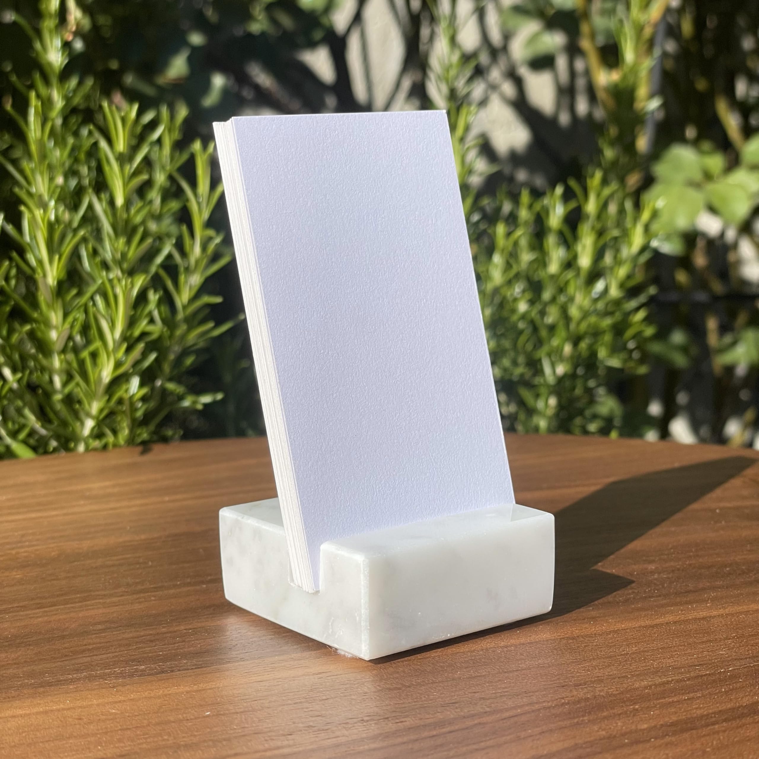 Remnant marble card holder representing recycled materials