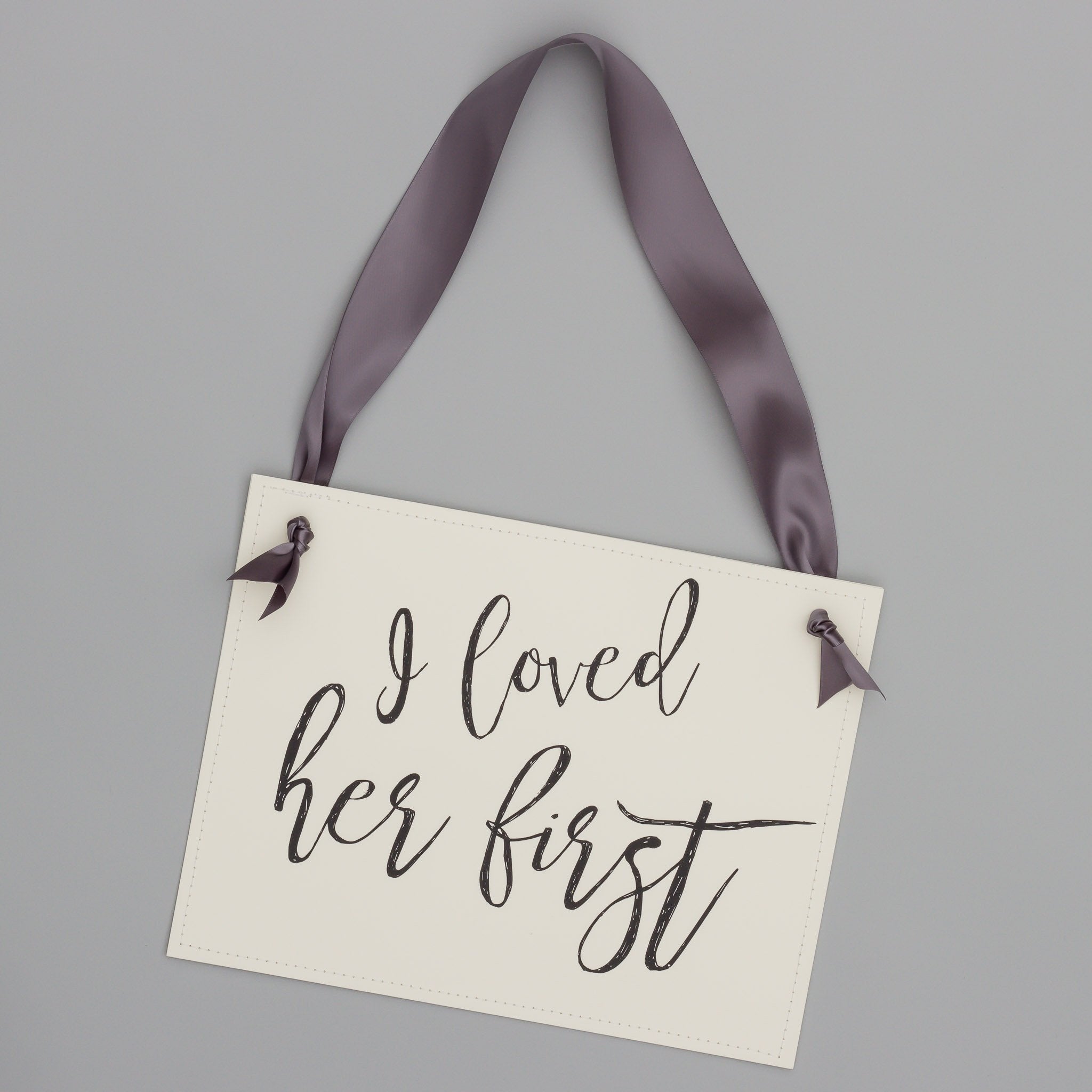 Hand tied satin ribbon around sign about 28 inches