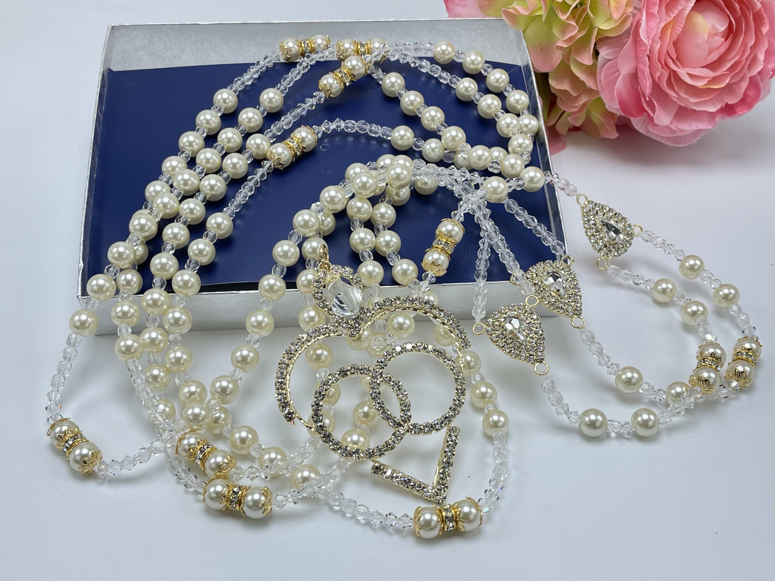 Ivory pearls and crystal lasso with 14kt gold plated heart center