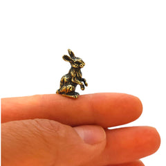 Jackrabbit brass figurine on display shelf