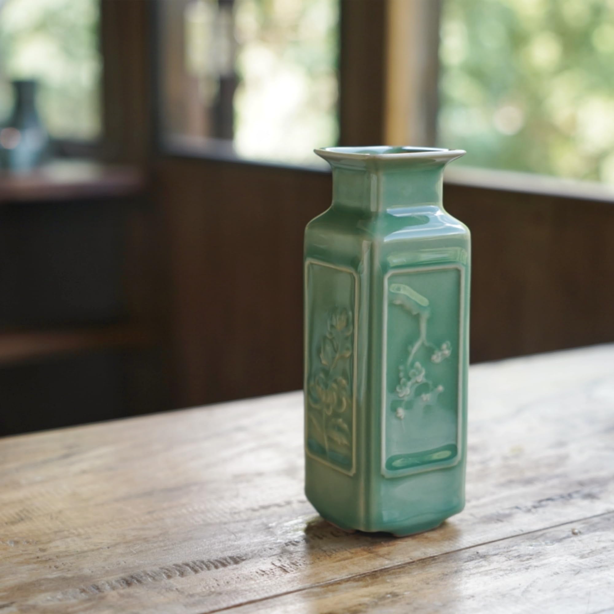 Sage green ceramic vase designed for Japandi minimalist interiors