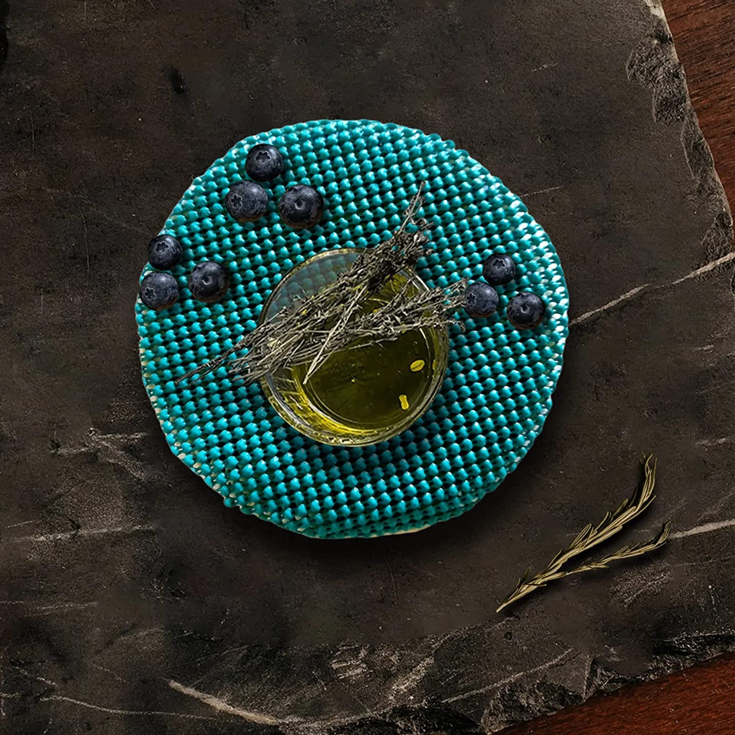 Jar opener gripper pad used as a kitchen aid in green