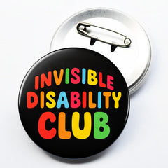 Pinback metal badge close up showing secure fastening