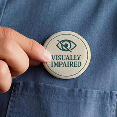 Pin-back metal badge designed for clothing bags and awareness