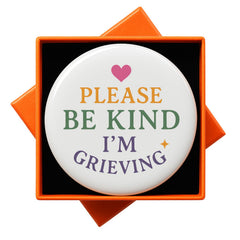 Front view of JNSVIEA I'm Grieving Please Be Kind badge pin button