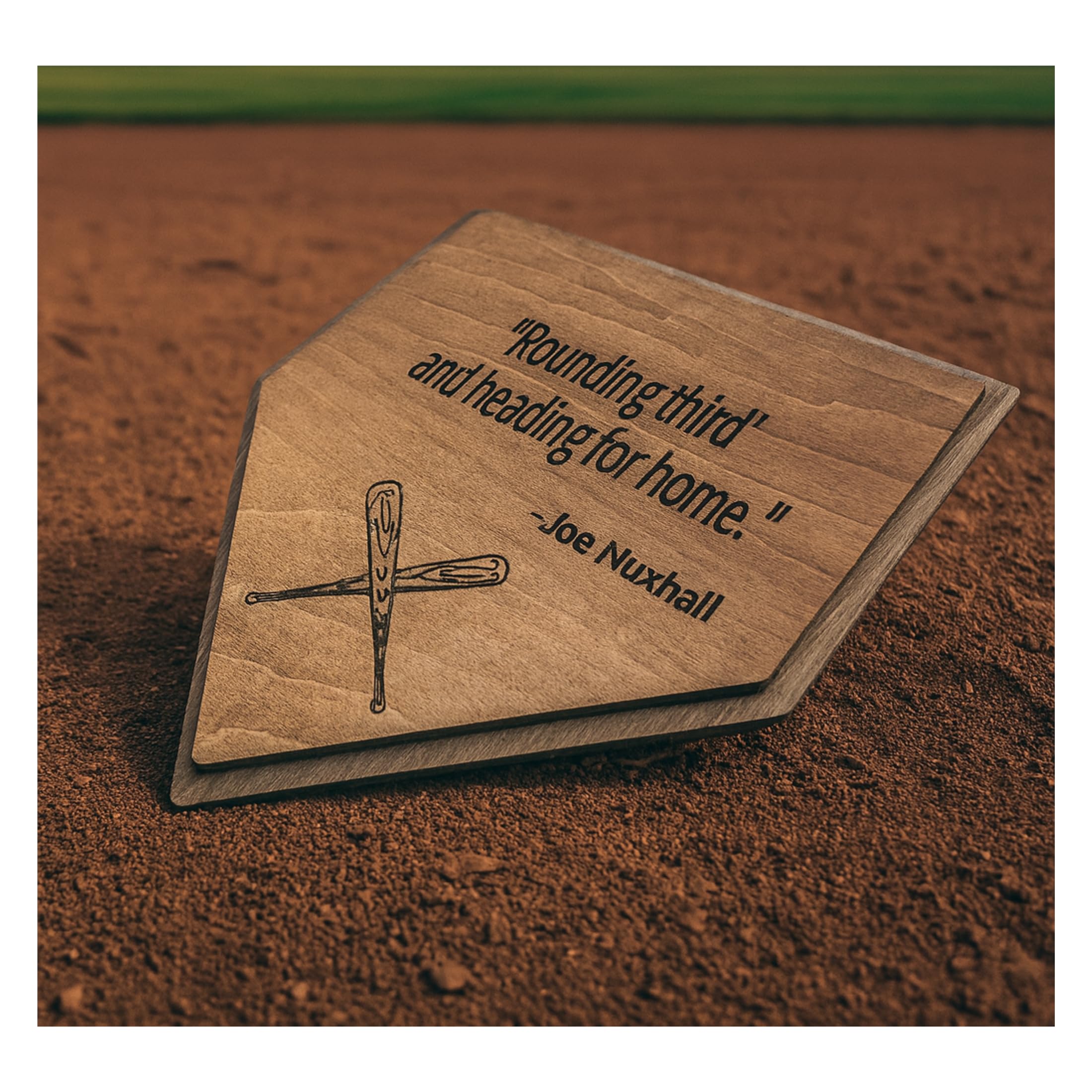 Wood wall art shaped like a home plate featuring a cross motif