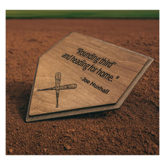 Wood wall art shaped like a home plate featuring a cross motif