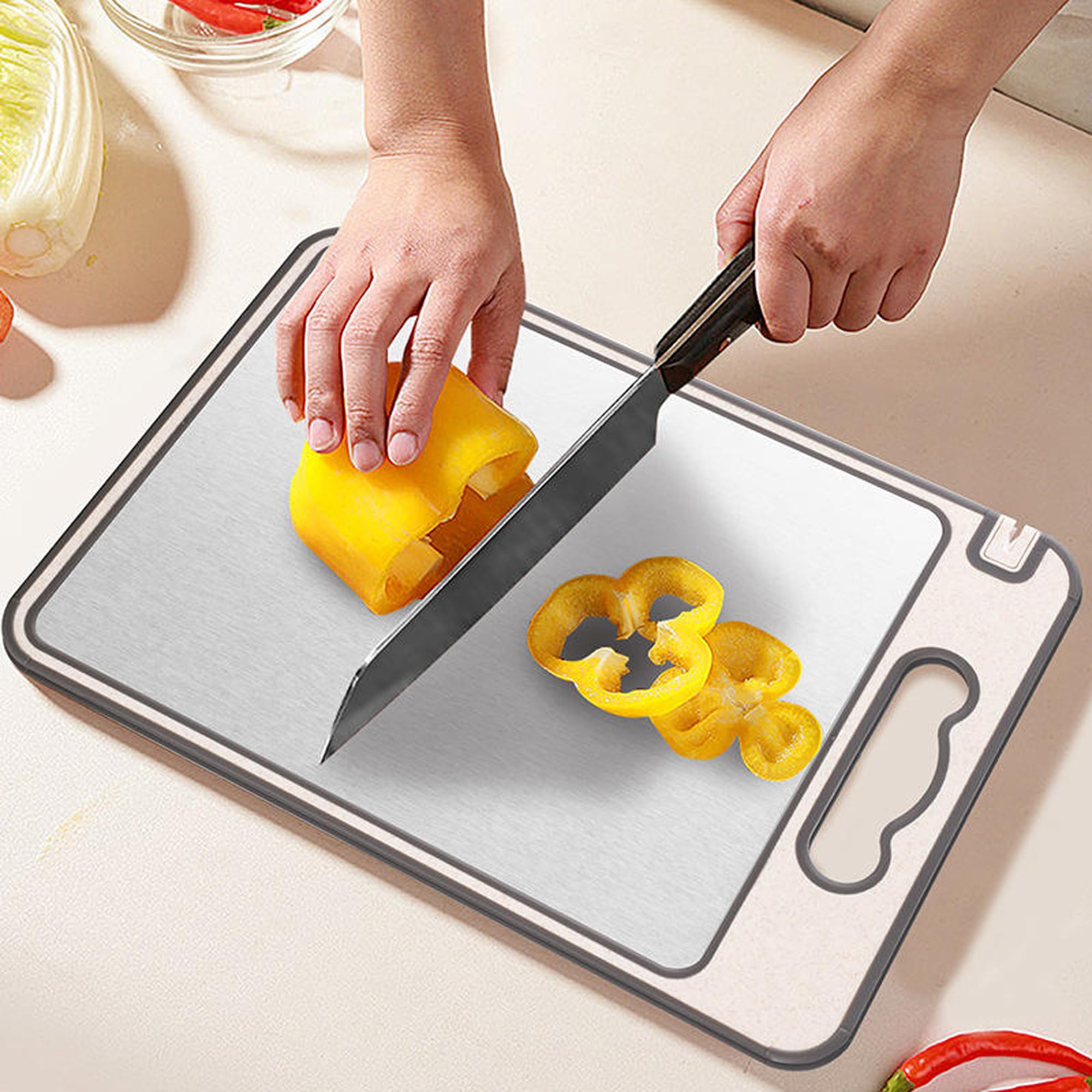 Cutting board with juice grooves for liquids