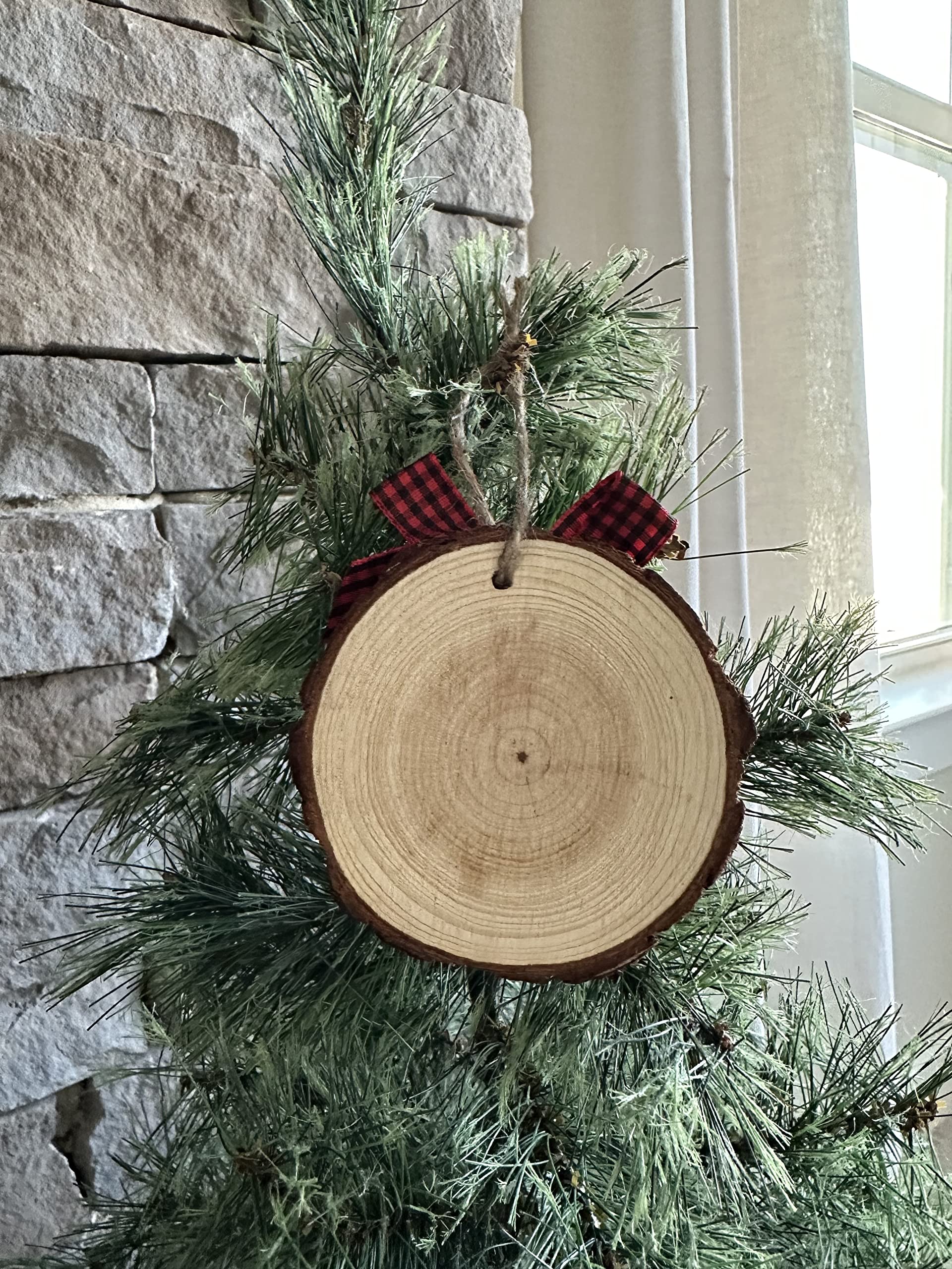 Jute twine hanger included for display on tree or mantle