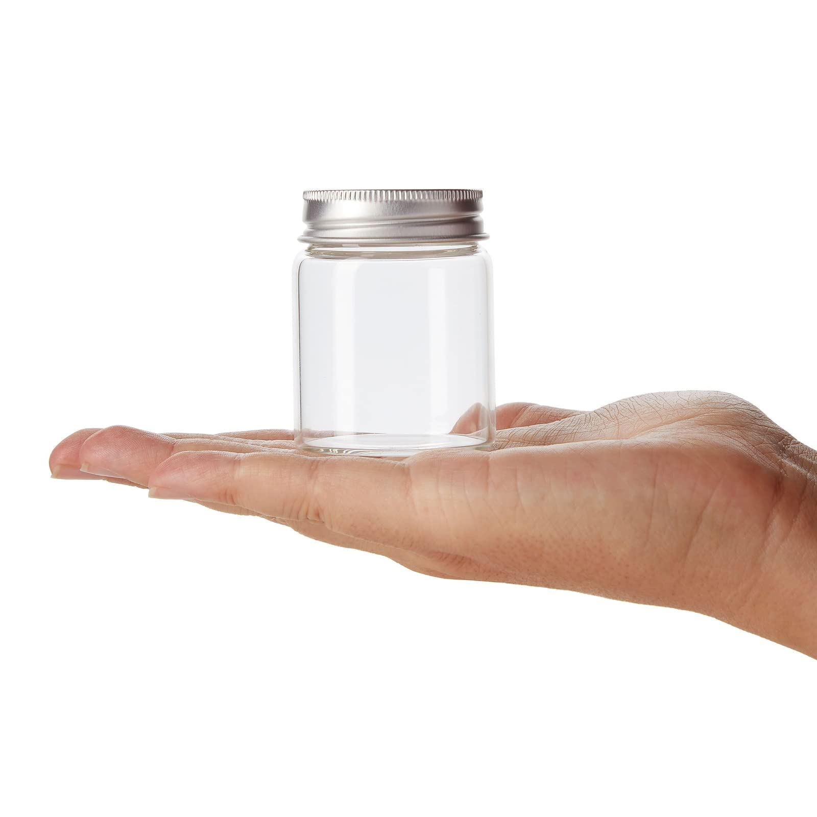 Small glass jars with stainless steel lids for travel