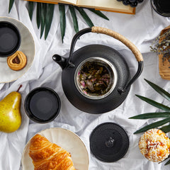 Juvale teaset includes infuser warmer and four cups