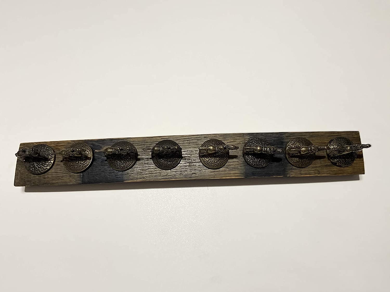 Lightly sanded stave with polyurethane finish on display