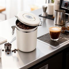 Stainless steel coffee canister with one-way venting valve on lid