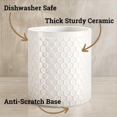 White ceramic utensil crock featuring honeycomb pattern