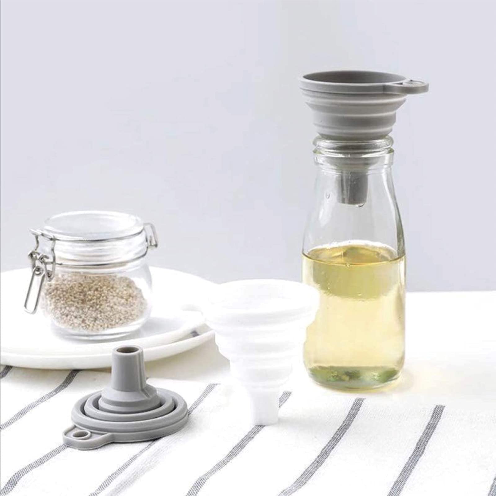Funnel with stabilizing tabs for bottle or jar