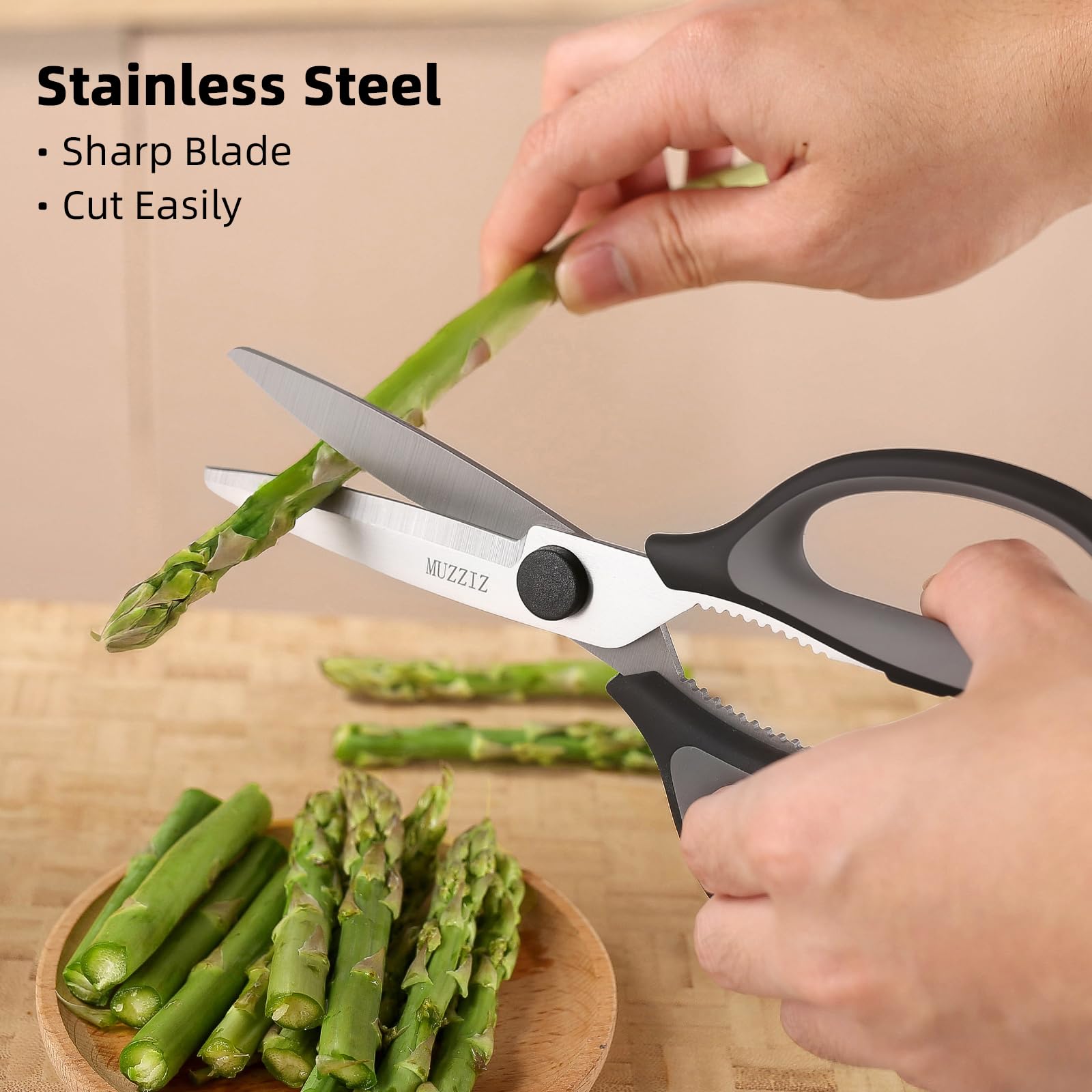 Versatile kitchen scissors cutting herbs meat and fish close shot