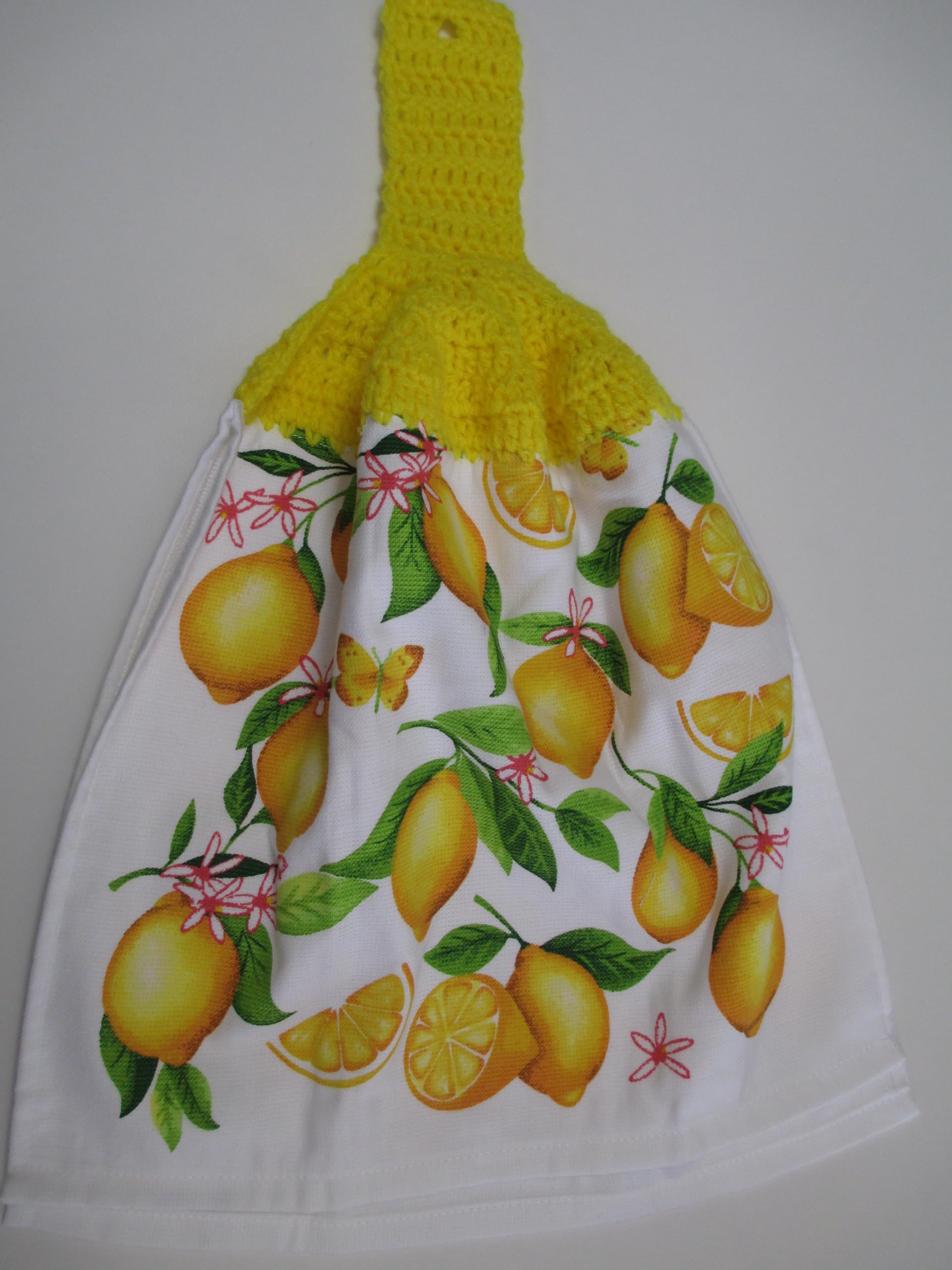 Towel with button for hanging on cabinet or oven handle
