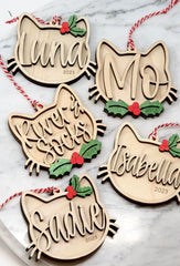 Kitten's First Christmas cat ornament with holly design