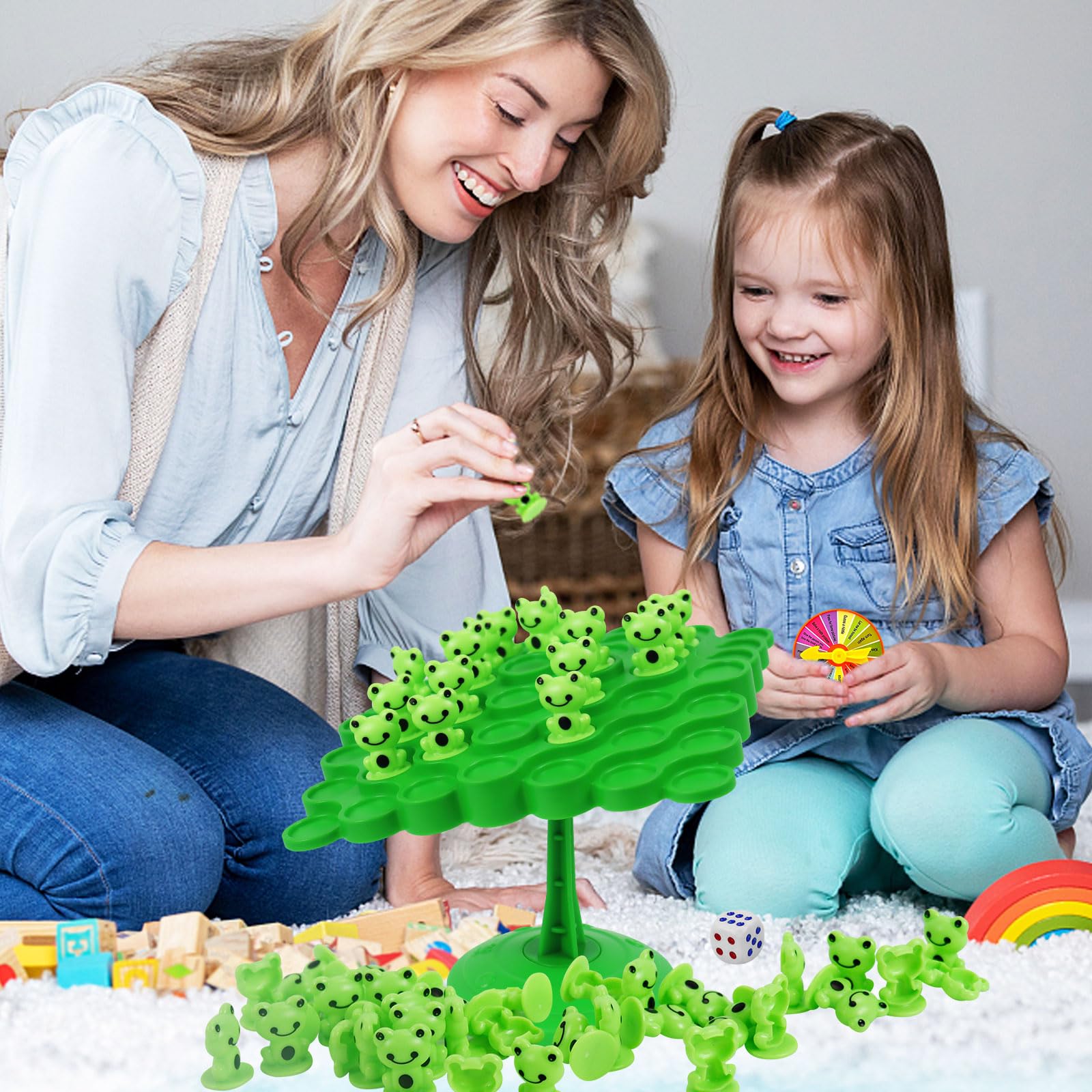 Colorful frog pieces and game components for family play