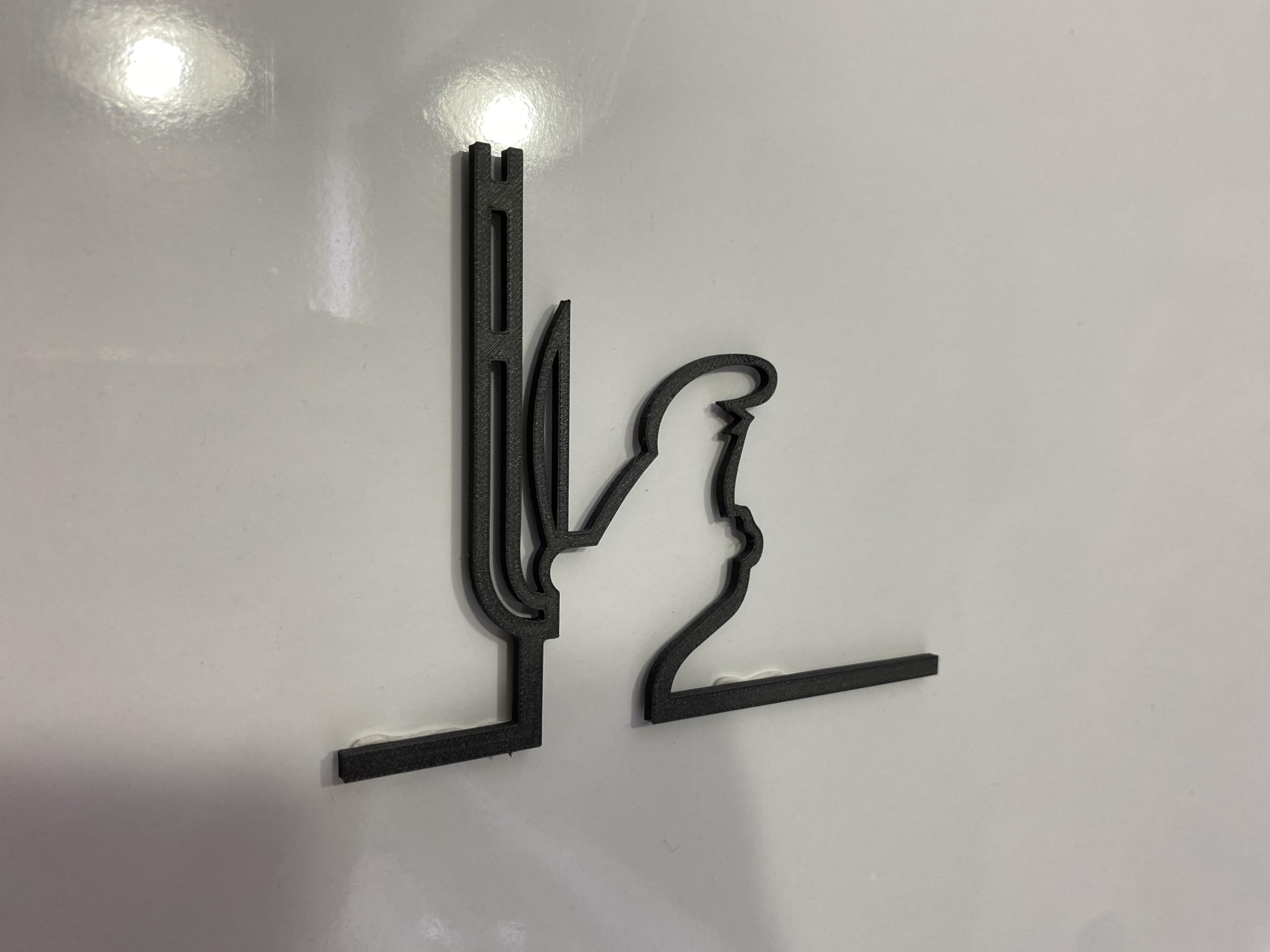 La Linea Figure wall art with glue pads included