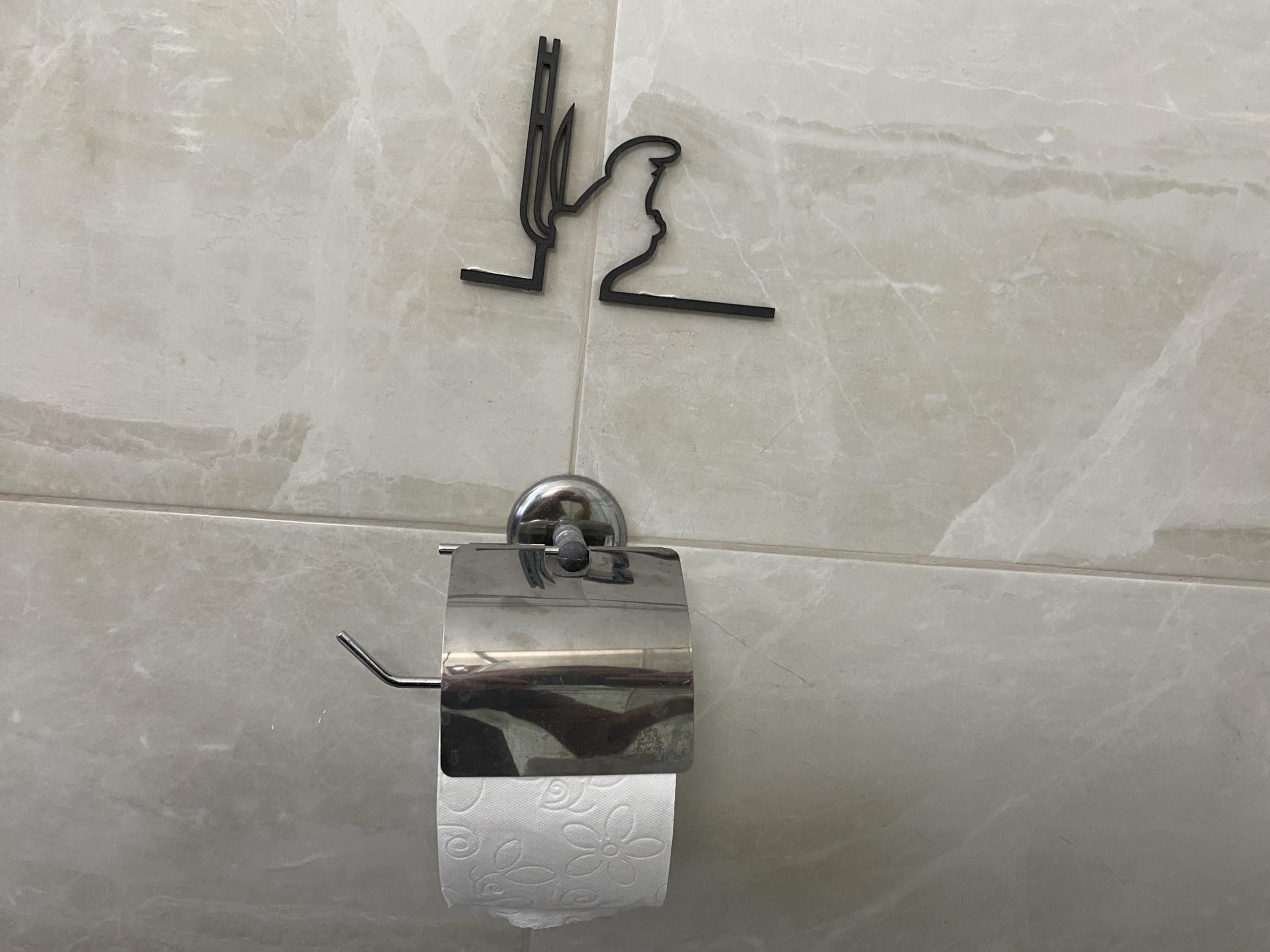 La Linea Figure On The Toilet mounted wall art