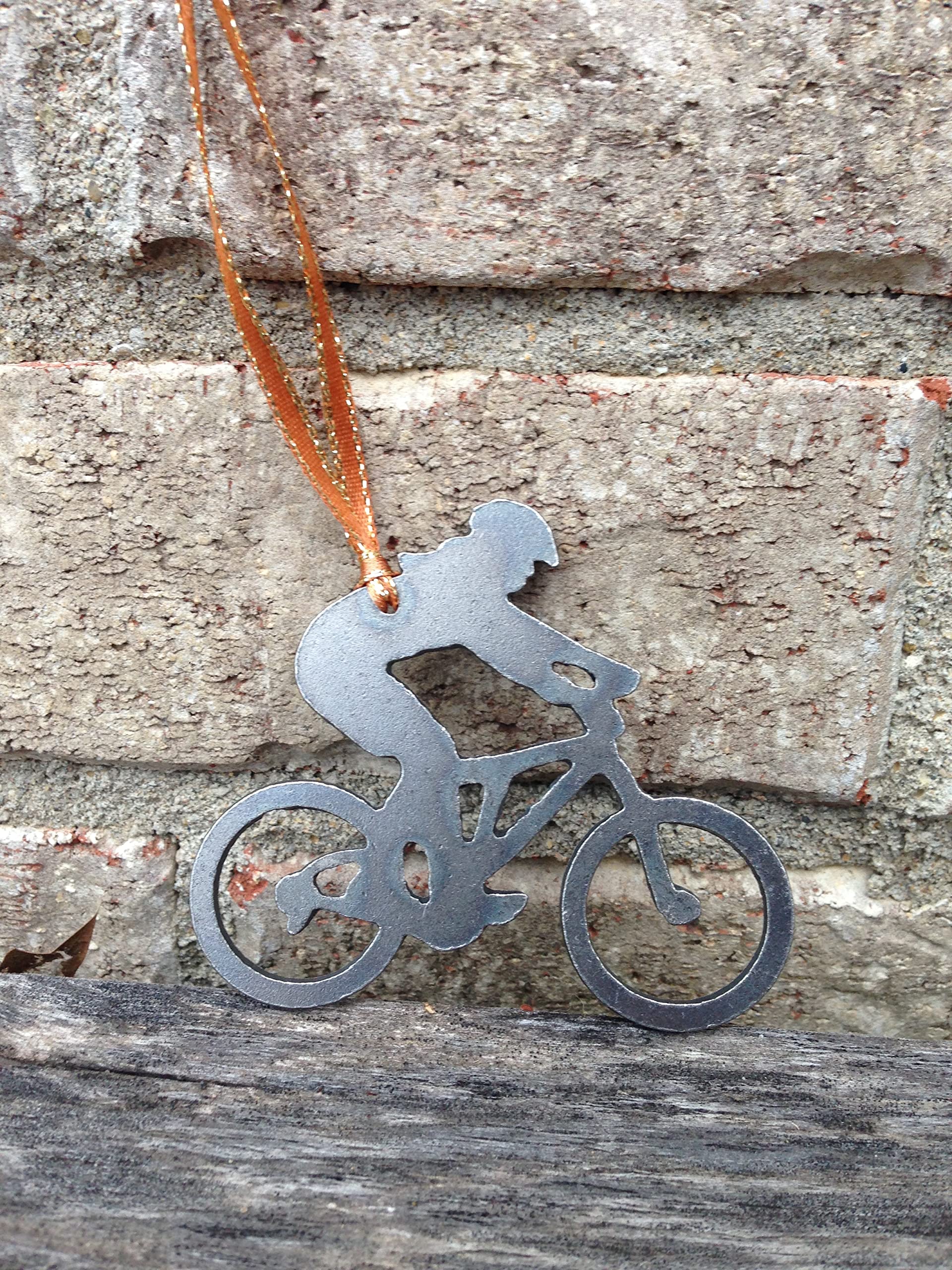 Gift idea for female mountain bikers featuring a steel ornament