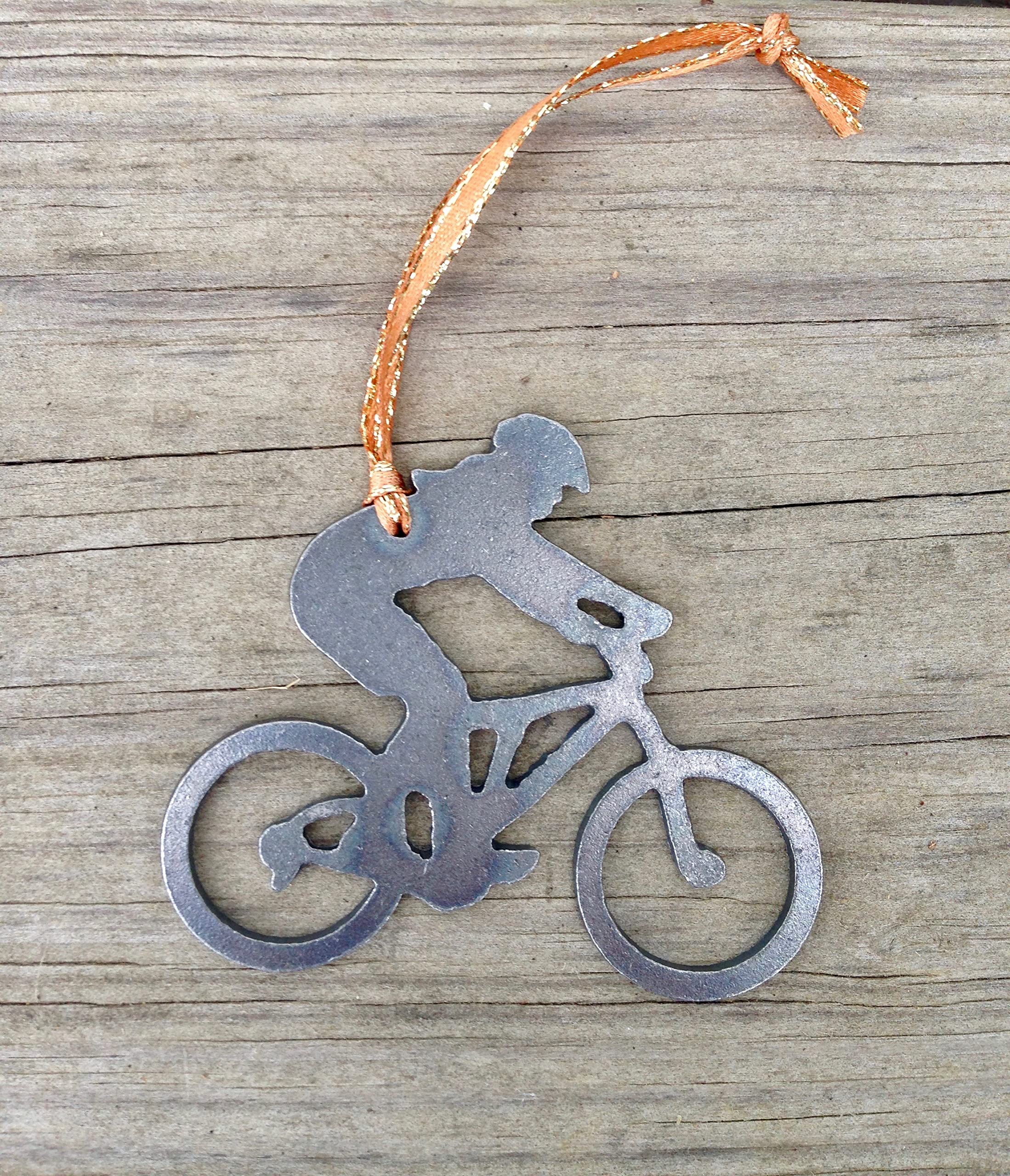 Recycled steel ornament with smooth edges and rustic finish