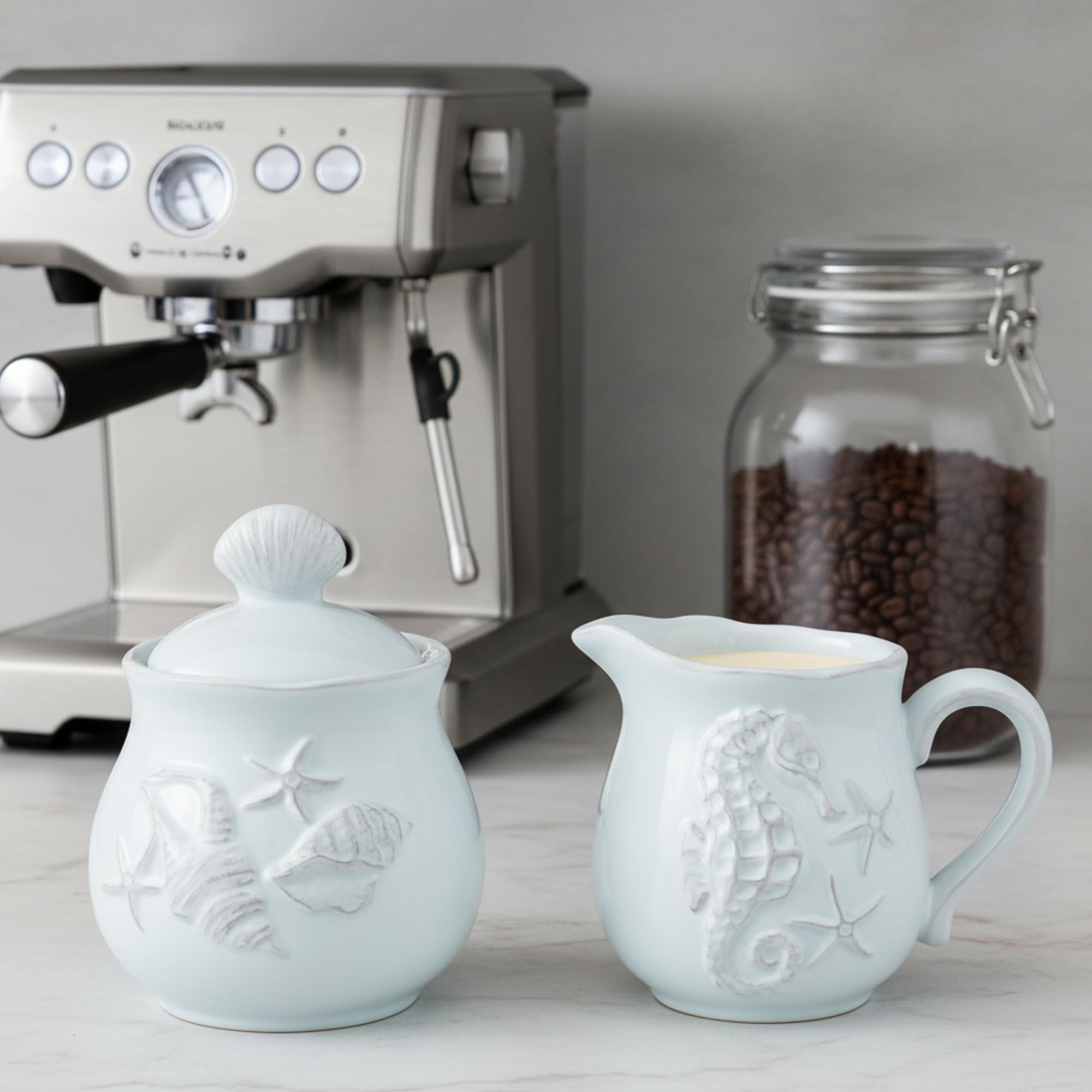 Laguna coastal creamer with sculpted seahorse relief