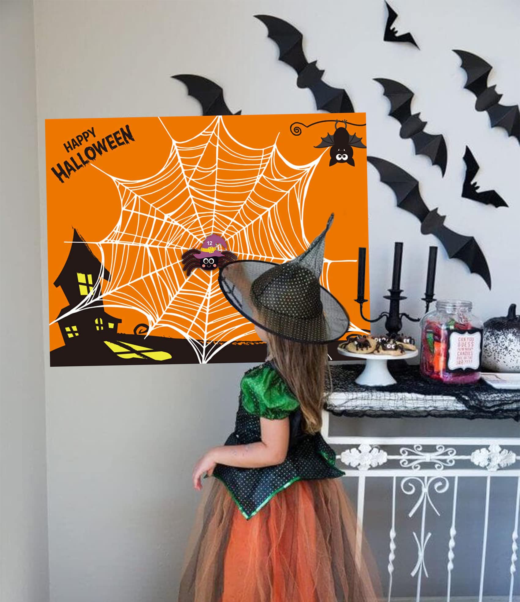 Large spider poster used as Halloween decor and party decoration
