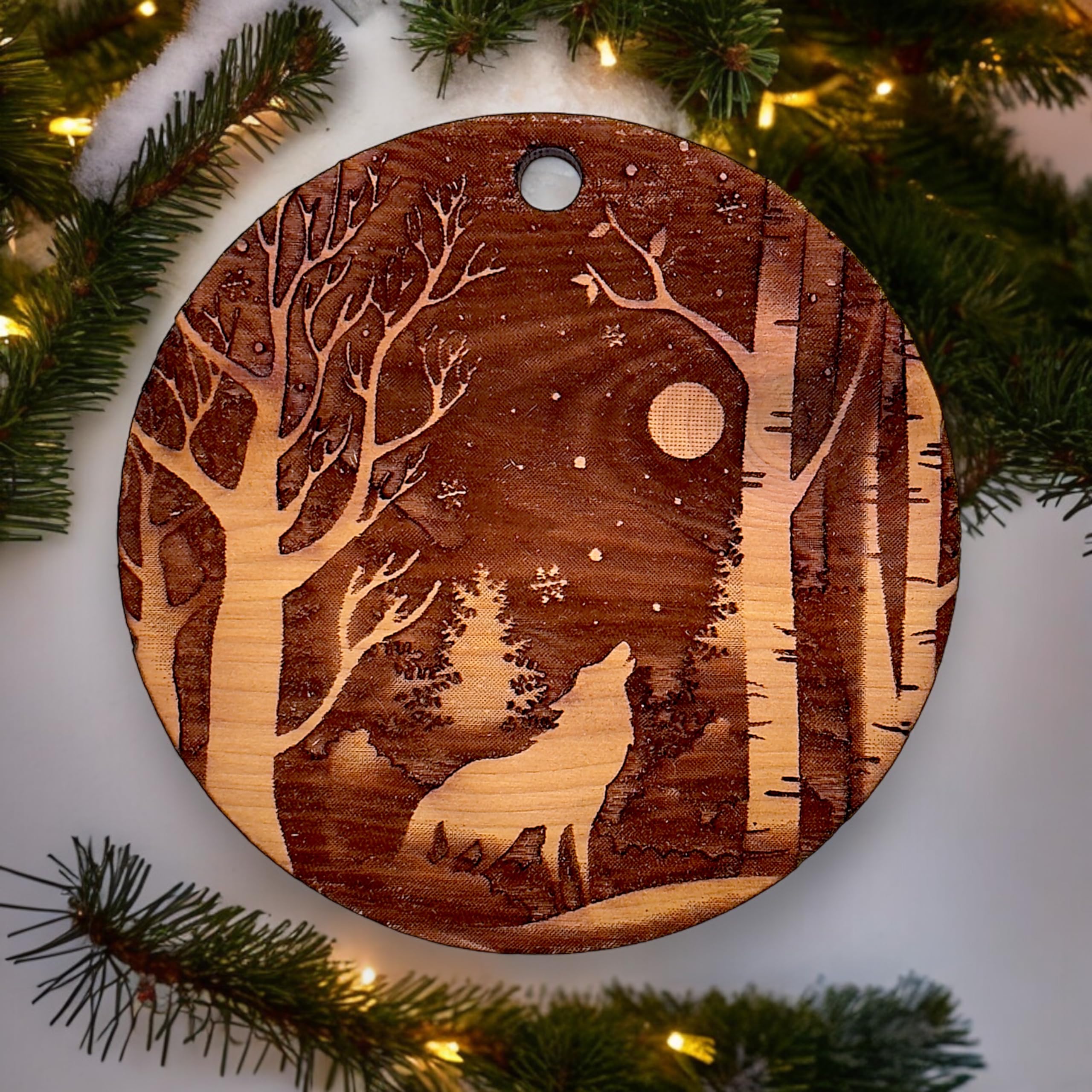 Laser cut cedar ornament Winter Wolf wood grain variation