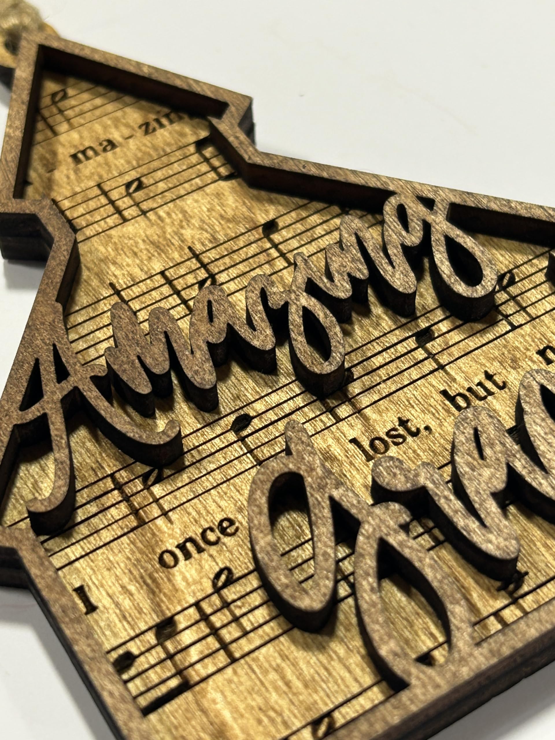 Top layer cut out the words Amazing Grace on wood ornament
