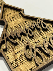 Top layer cut out the words Amazing Grace on wood ornament