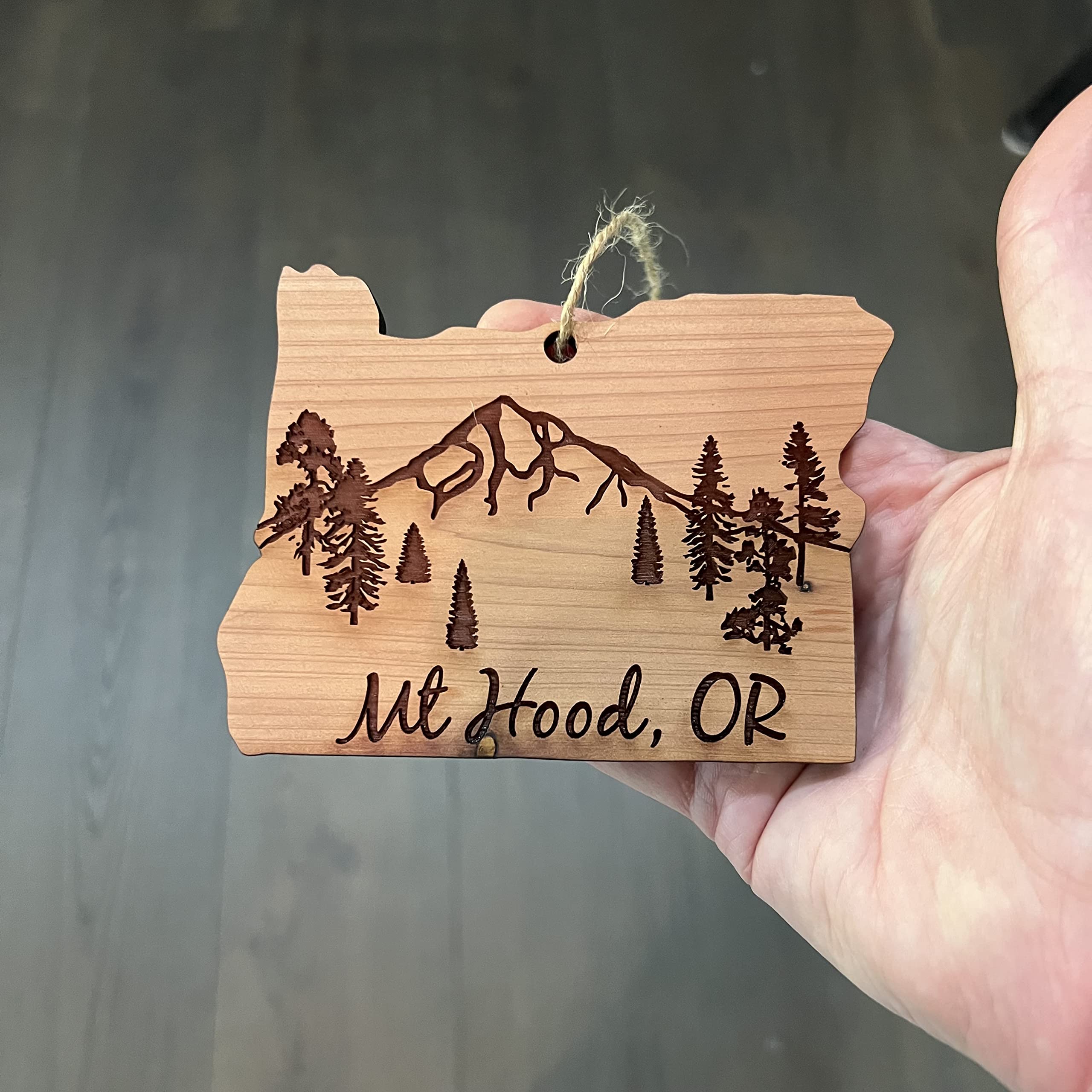 Laser engraved cedar ornament front sanded surface