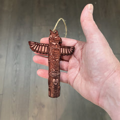 Natural cedar ornament with varied wood grain color