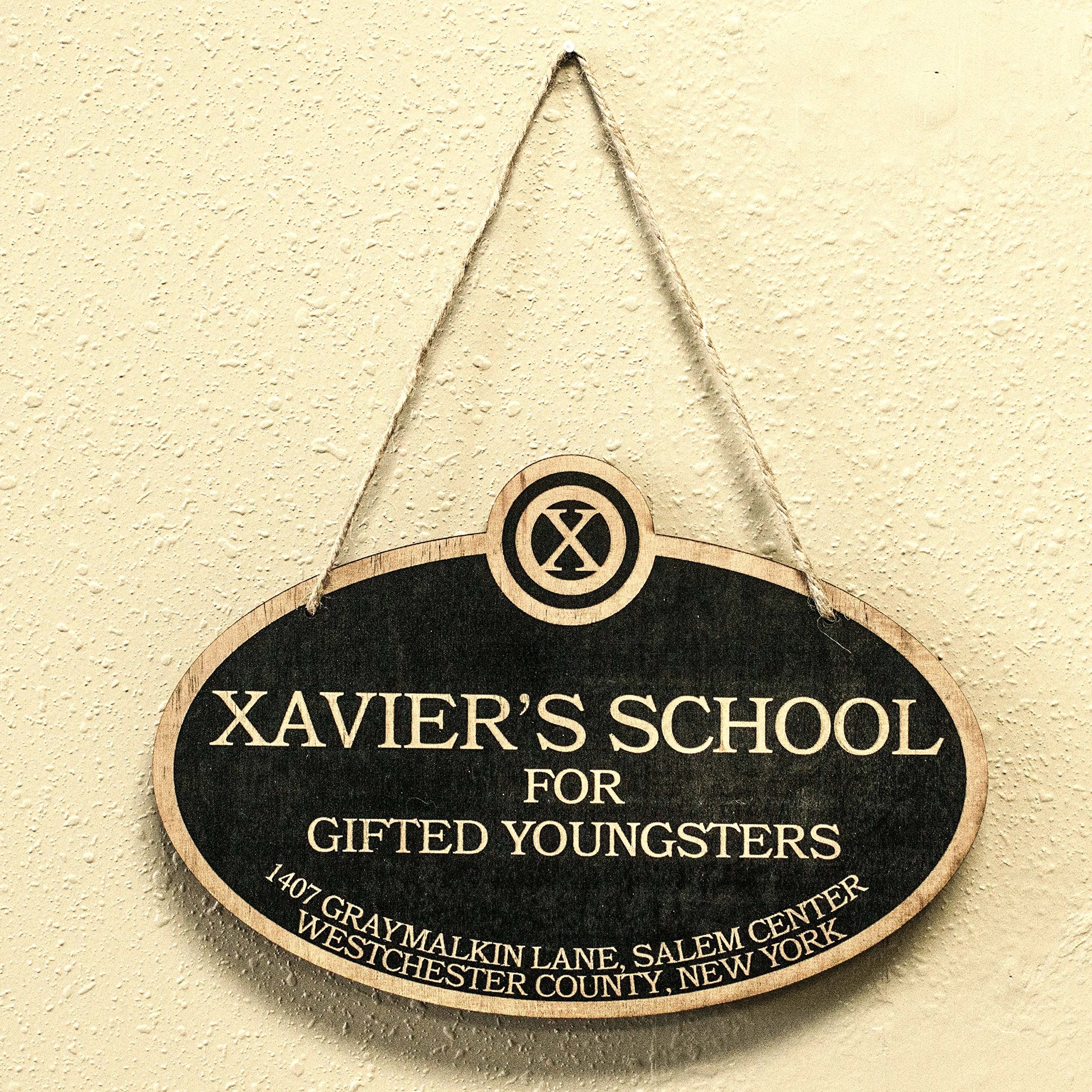 Laser engraved lettering on Xavier's School sign