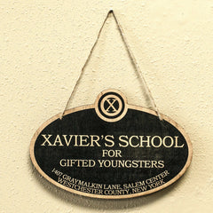 Laser engraved lettering on Xavier's School sign