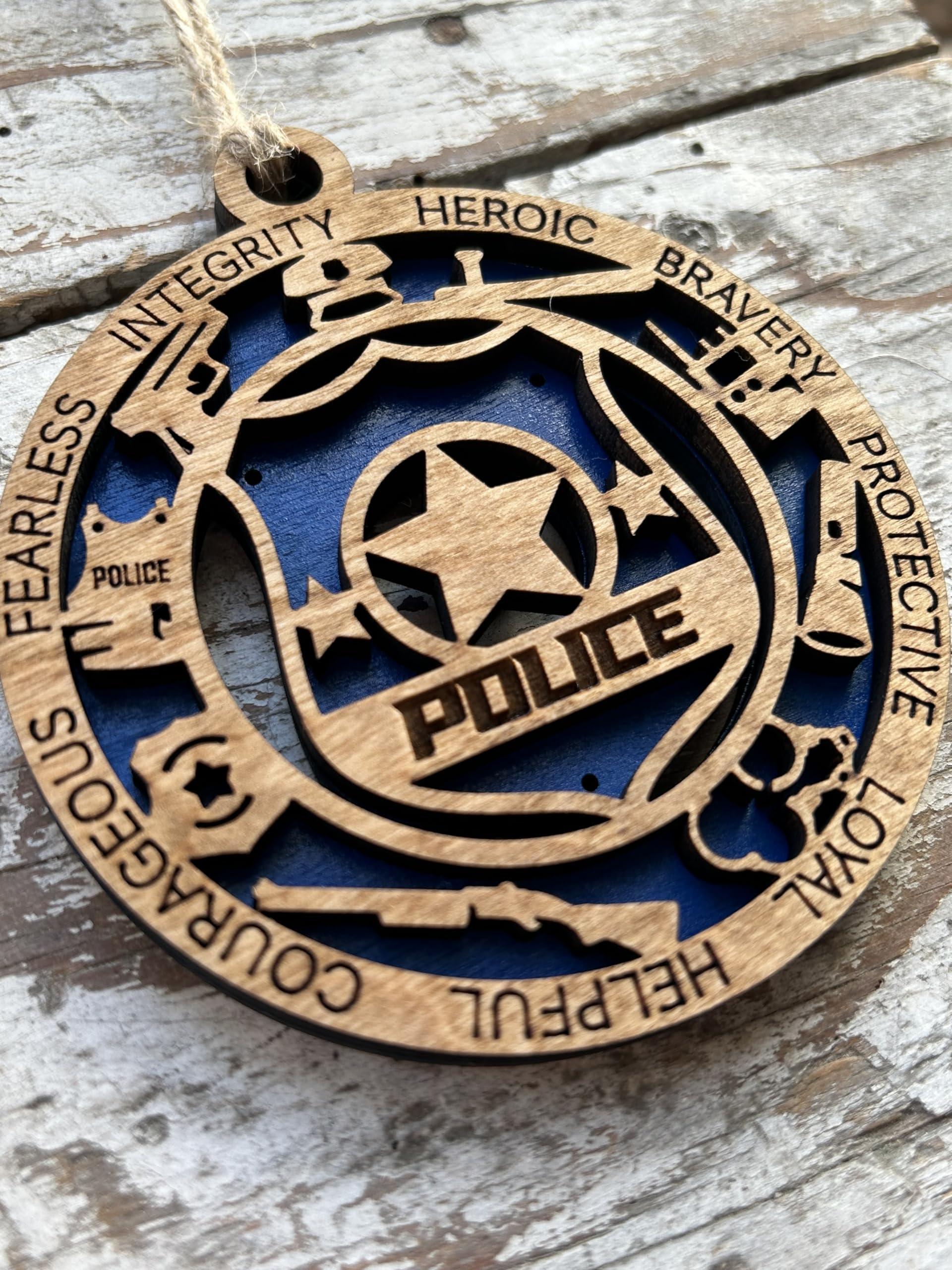Law Enforcement Christmas Ornament hanging on a tree