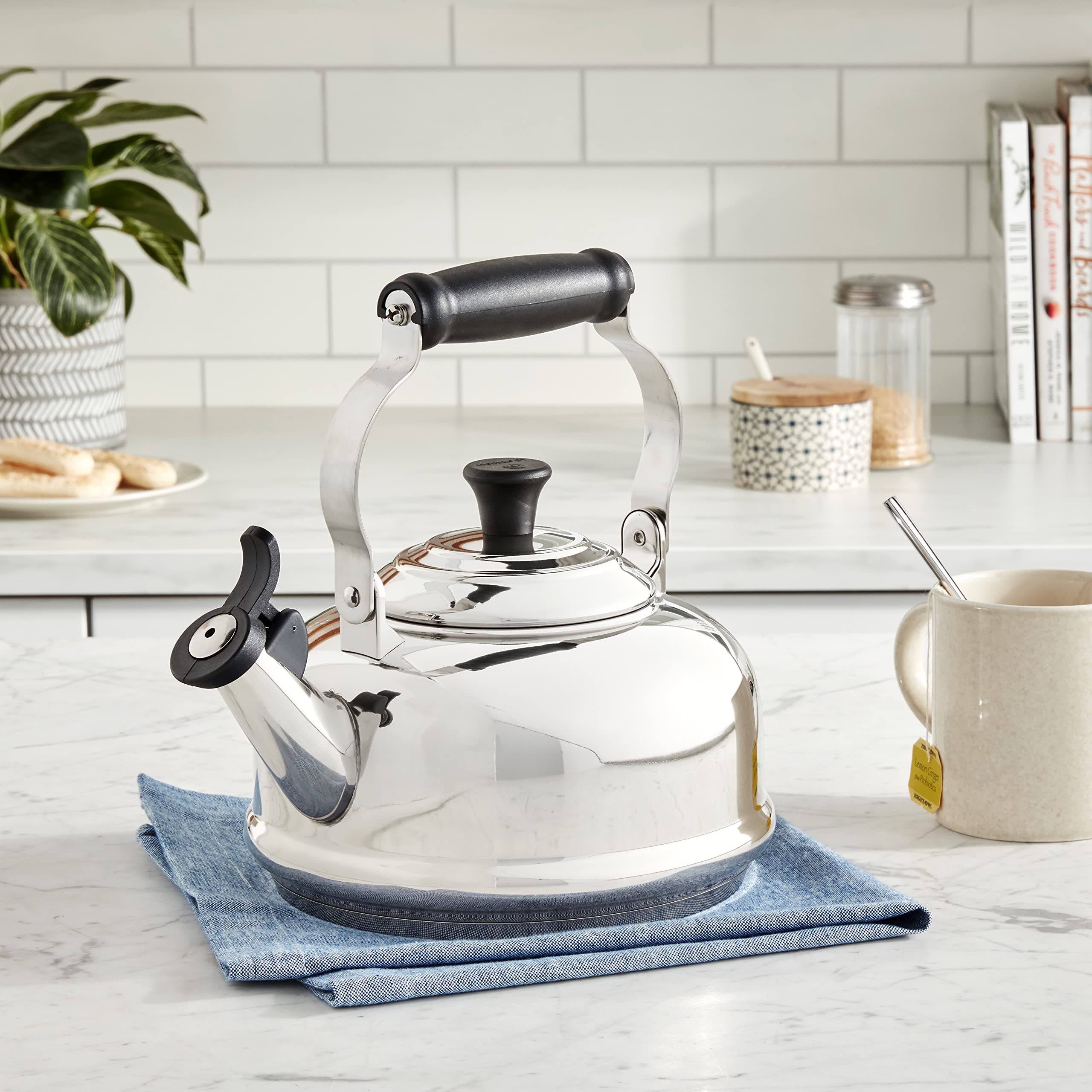 Le Creuset enamel on steel kettle showing min and max fill markings