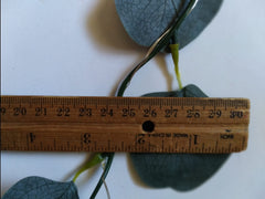 LED illuminated eucalyptus garland on display