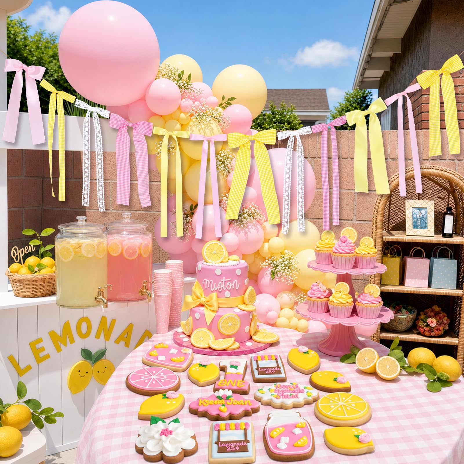 Lemon themed party decor with bow garland