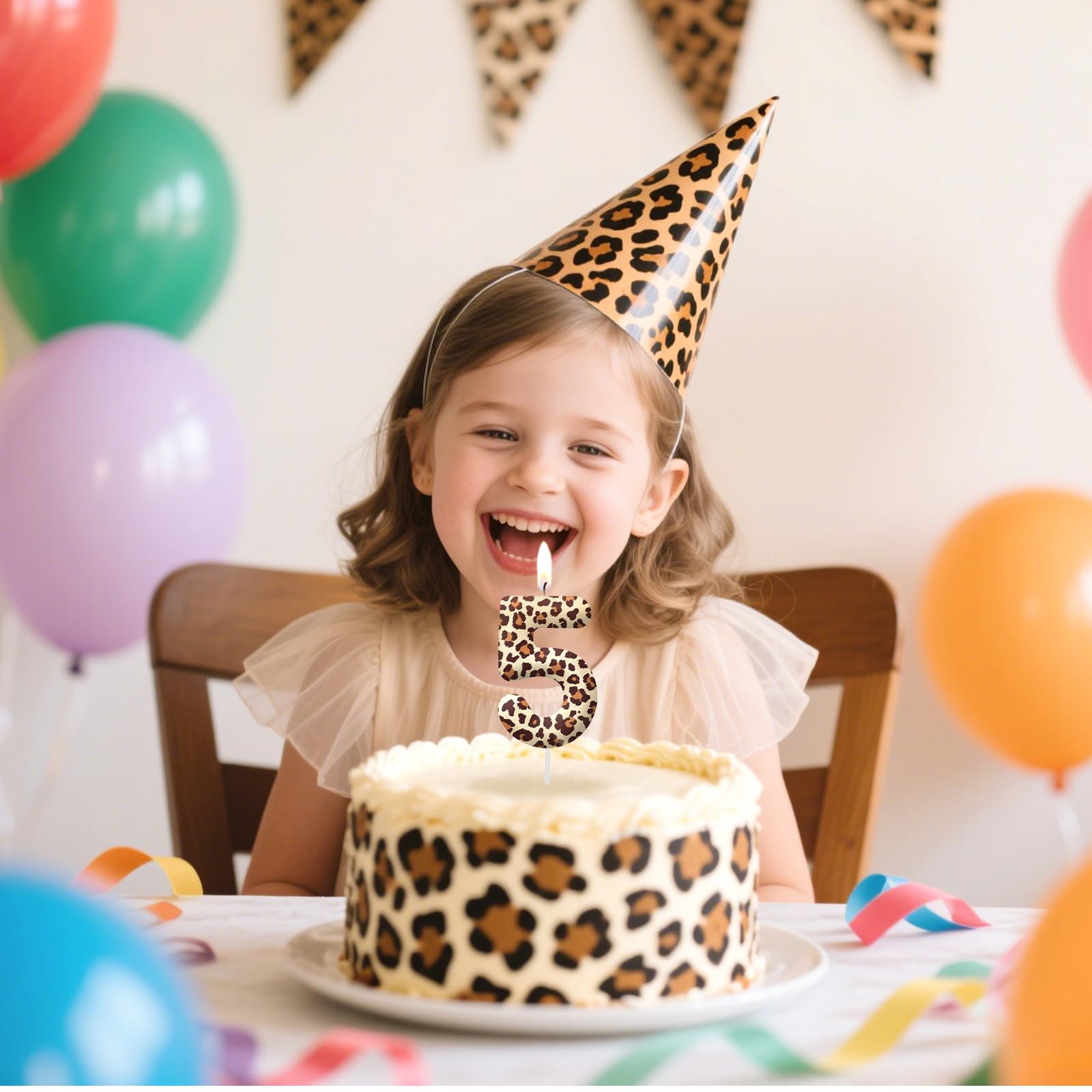Leopard print cake topper and candles for party decoration