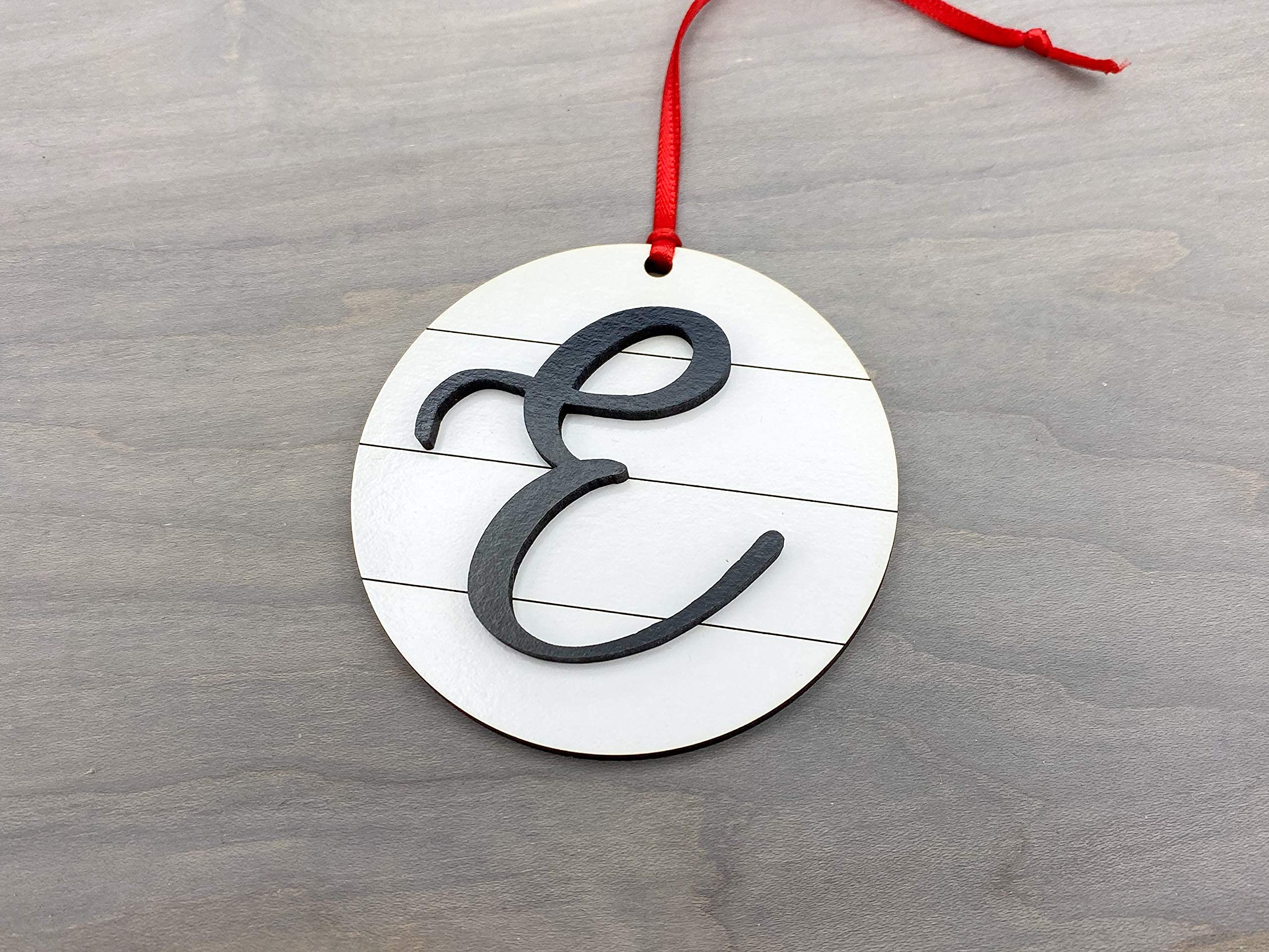 Letter E ornament back view with black finish