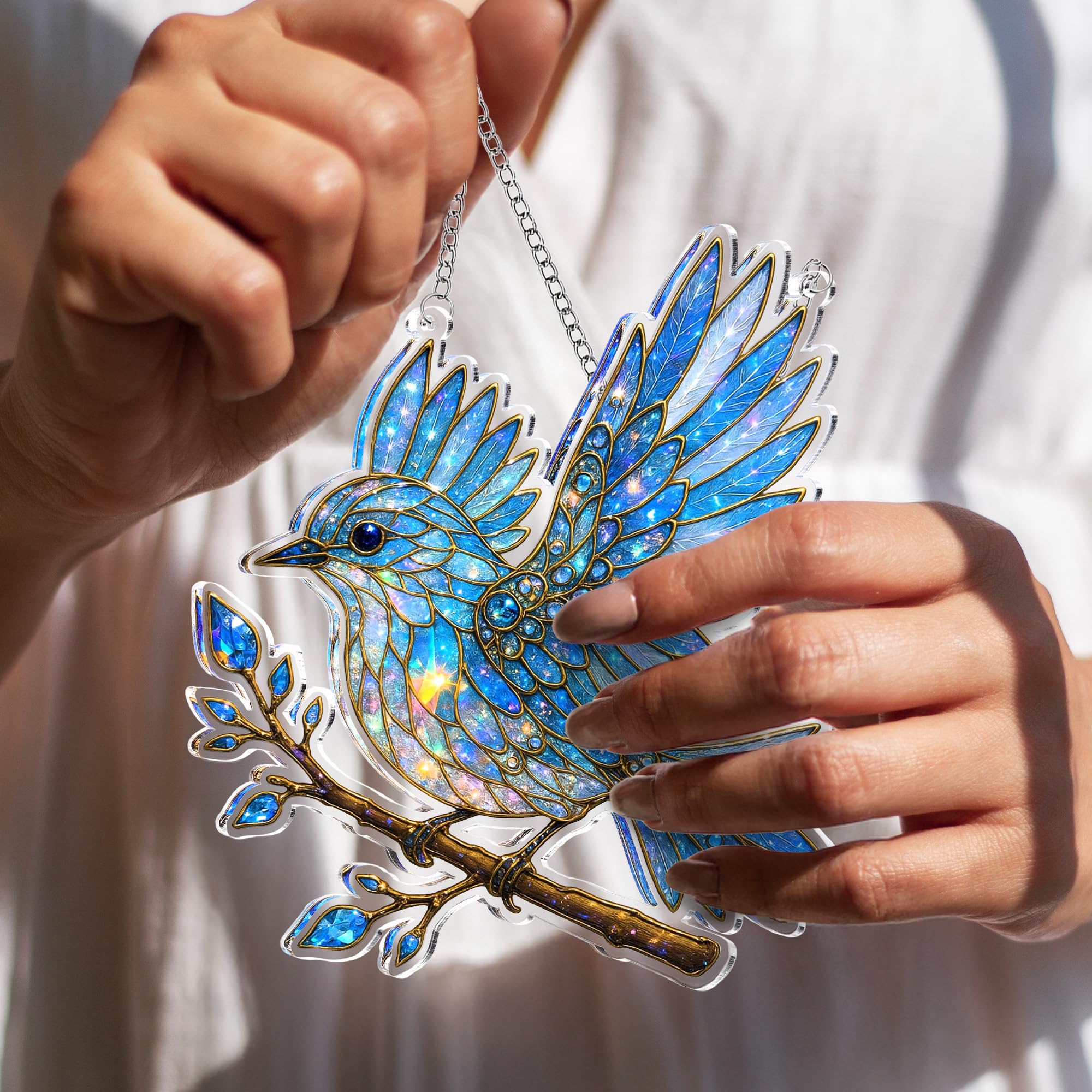 15x15x1 cm bluebird ornament displayed on a windowsill