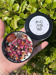 Lilith Candle altar offering with crystals and rose petals