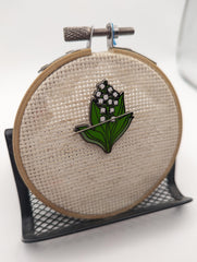 Lily of The Valley Needle Minder resting needle on fabric