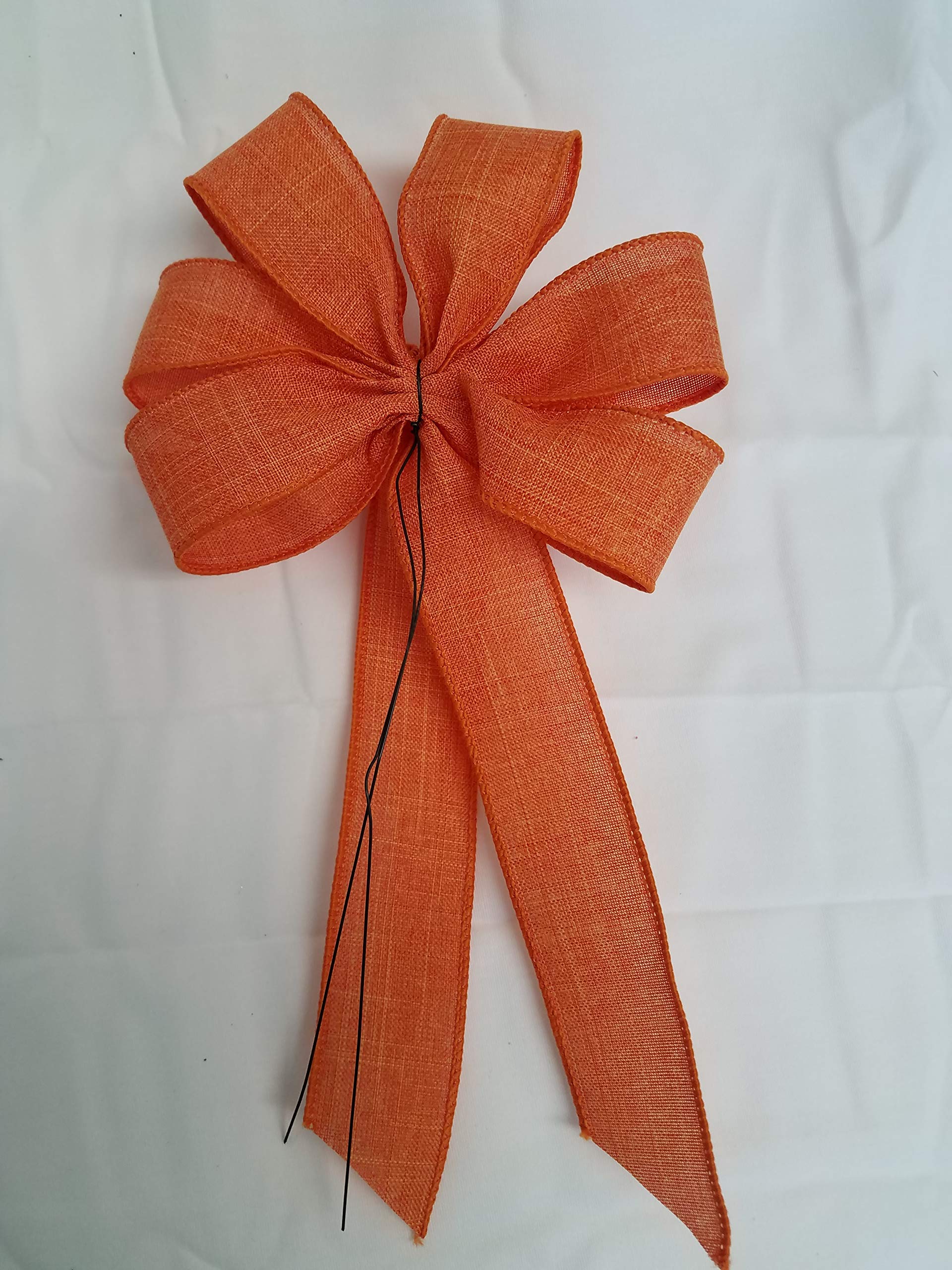 5-6 inch wreath bow measures across 10-11 inch tail