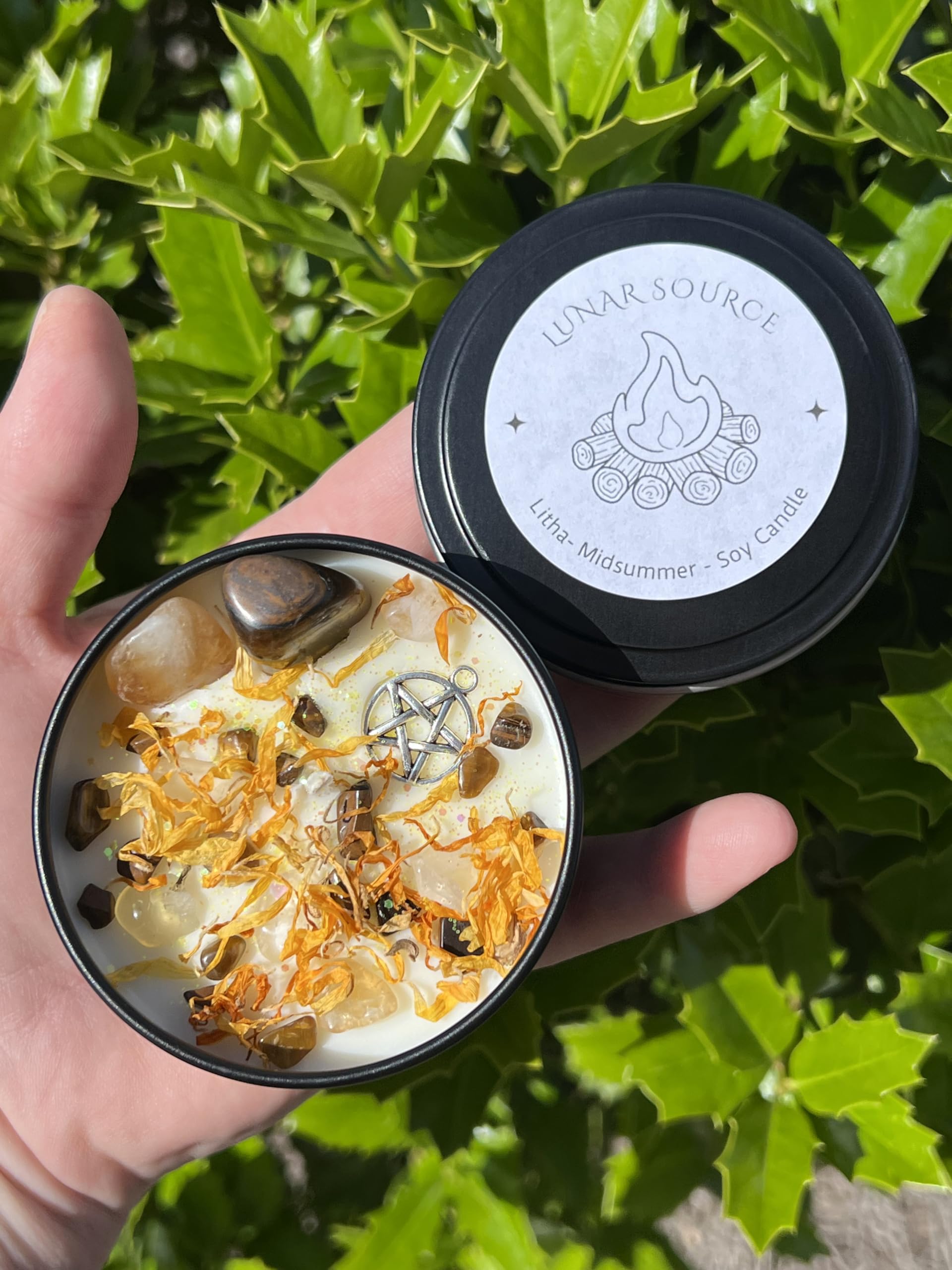 Citrine and Tiger Eye crystals topping candle with crystal chips